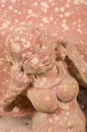 A large Indian red sandstone stupa pillar with a devata shown as a woman and lotus flowers, probably Matura region, ca. 2nd C. b.C - 2nd C.