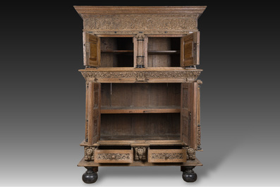 A Dutch elaborate carved oak Renaissance four-door cupboard, 17th C.