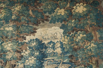 A Flemish verdure wall tapestry with two swans in a lake, probably Oudenaarde, late 17th C.