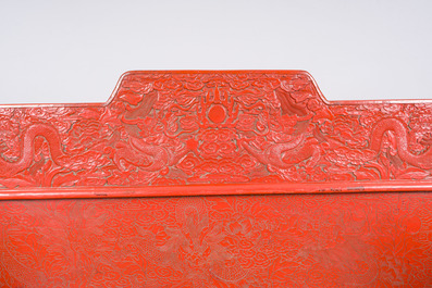 A Chinese five-piece red lacquer throne ensemble with dragons in imperial Qianlong style, 20th C.