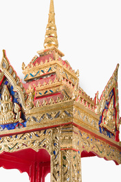 A large Thai glass-inlaid partially gilt wooden house altar, 20th C.