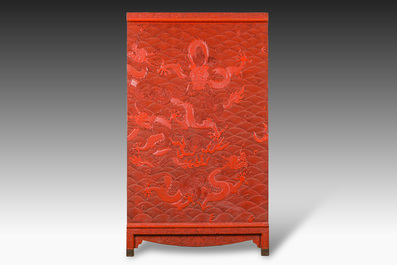 A Chinese five-piece red lacquer throne ensemble with dragons in imperial Qianlong style, 20th C.