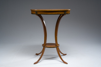 Jean-Joseph Chapuis (1765-1864): A brass inlaid wooden gueridon on four curved supports, first quarter 19th C.