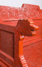 A Chinese five-piece red lacquer throne ensemble with dragons in imperial Qianlong style, 20th C.
