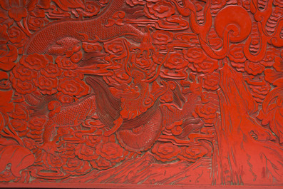 A Chinese five-piece red lacquer throne ensemble with dragons in imperial Qianlong style, 20th C.