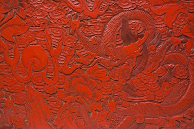 A Chinese five-piece red lacquer throne ensemble with dragons in imperial Qianlong style, 20th C.