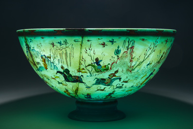 A large turquoise glass bowl painted with battle, hunting and polo scenes, Qajar, Iran, 19th C.