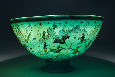 A large turquoise glass bowl painted with battle, hunting and polo scenes, Qajar, Iran, 19th C.