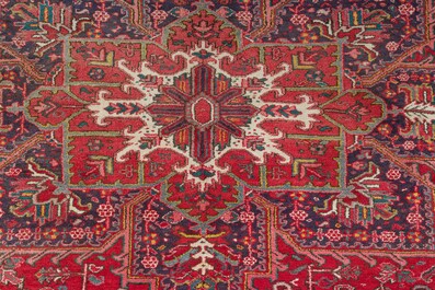 A Persian Heriz rug with 'Ahar' design, wool on cotton, 20th C.