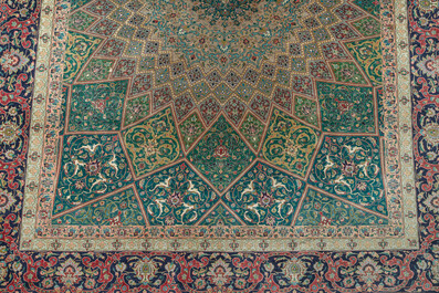 A Persian Tabriz rug with floral design, wool on cotton, first half 20th C.