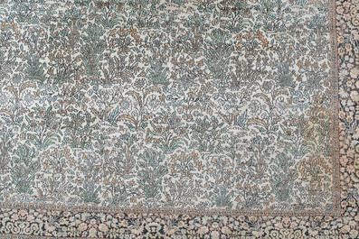 An Indian silk Kashmir rug with floral design, 20th C.