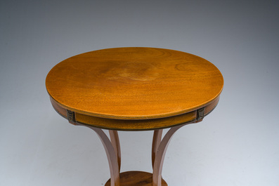 Jean-Joseph Chapuis (1765-1864): A brass inlaid wooden gueridon on four curved supports, first quarter 19th C.