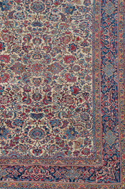 A Persian Isfahan rug with floral design, wool on silk, first half 20th C.