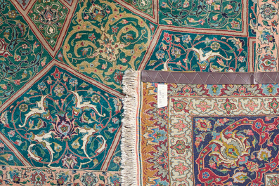 A Persian Tabriz rug with floral design, wool on cotton, first half 20th C.