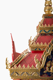 A large Thai glass-inlaid partially gilt wooden house altar, 20th C.