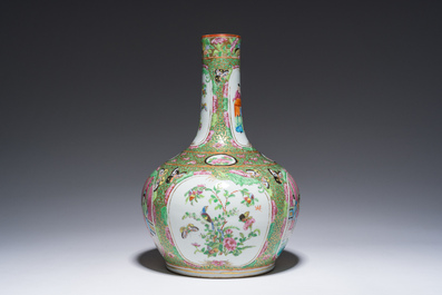 A Chinese bottle-shaped Canton famille rose vase with palace scenes and birds and butterflies among blossoming branches, 19th C.