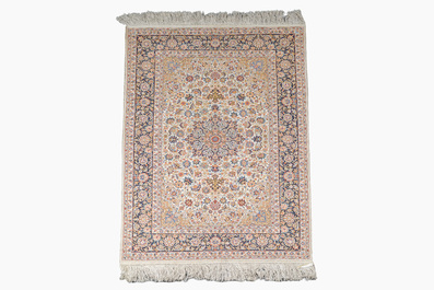 A Sino-Tabriz silk rug with floral design, 20th C.