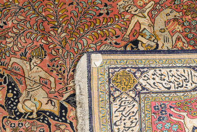 A Persian Qom (Qum/Ghom) silk rug with hunting scenes, 20th C.
