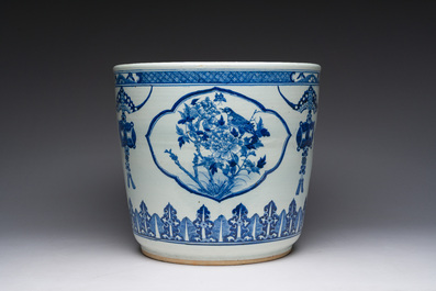 A Chinese blue and white jardini&egrave;re with figurative medallions, 19th C.