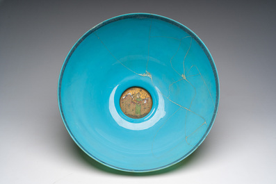A large turquoise glass bowl painted with battle, hunting and polo scenes, Qajar, Iran, 19th C.