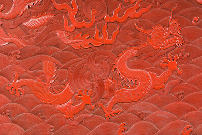 A Chinese five-piece red lacquer throne ensemble with dragons in imperial Qianlong style, 20th C.