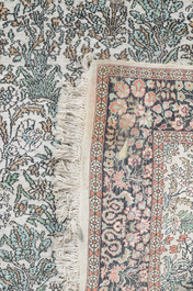 An Indian silk Kashmir rug with floral design, 20th C.