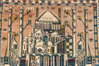 A Caucasian wool Baluch (Balochi) or Shirvan carpet depicting a mosque, dated 1943
