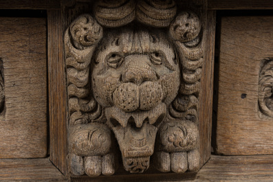 A Dutch elaborate carved oak Renaissance four-door cupboard, 17th C.