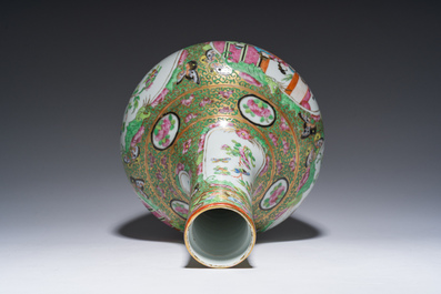 A Chinese bottle-shaped Canton famille rose vase with palace scenes and birds and butterflies among blossoming branches, 19th C.