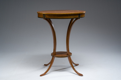 Jean-Joseph Chapuis (1765-1864): A brass inlaid wooden gueridon on four curved supports, first quarter 19th C.