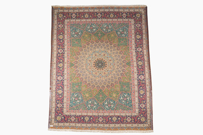 A Persian Tabriz rug with floral design, wool on cotton, first half 20th C.