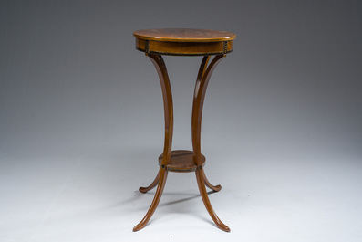 Jean-Joseph Chapuis (1765-1864): A brass inlaid wooden gueridon on four curved supports, first quarter 19th C.
