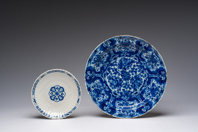 Five blue, white and polychrome Dutch Delft dishes, a lamp-mounted vase and a Brussels faience tobacco jar, 17th/19th C.