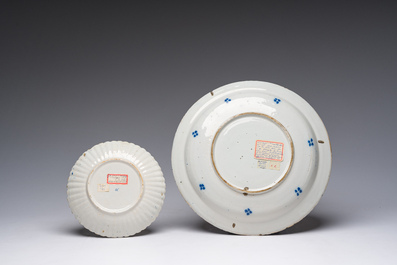 Five blue, white and polychrome Dutch Delft dishes, a lamp-mounted vase and a Brussels faience tobacco jar, 17th/19th C.