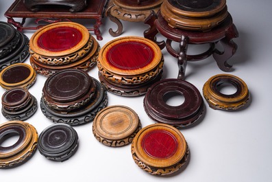 A collection of Chinese wooden stands, 20th C.