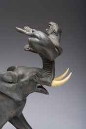 Illegibly signed: An elephant attacked by two tigers, zamak on a marble and onyx base, second quarter 20th C.