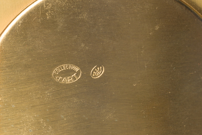 Two gilt bronze mantel clocks and a pair of four-light caryatid-shaped candlesticks, France and Germany, 19th/20th C.