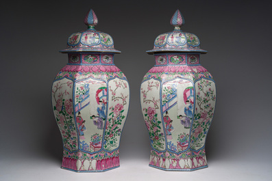 A pair of French Samson famille rose style vases and covers with animated scenes and floral design, Paris, 19th C.