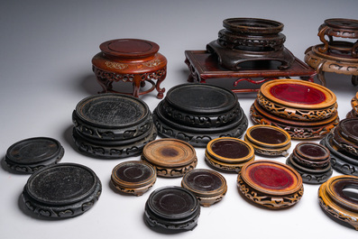 A collection of Chinese wooden stands, 20th C.
