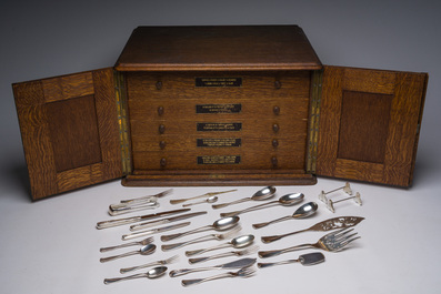 A Belgian oak cutlery case with a 227-piece silver cutlery set, 800/000, Wolfers, 20th C.