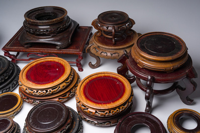 A collection of Chinese wooden stands, 20th C.