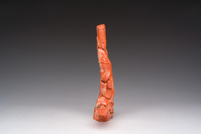 A Chinese red coral group with a scholar, his servant and a monkey, two-character mark, 19th C.