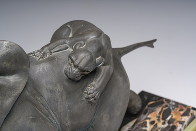 Illegibly signed: An elephant attacked by two tigers, zamak on a marble and onyx base, second quarter 20th C.