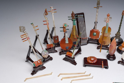 A Chinese collection of agate carved musical instruments with an accompanying presentation box, Republic, 20th C.