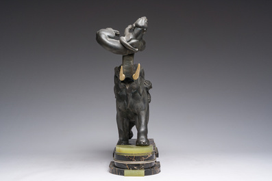 Illegibly signed: An elephant attacked by two tigers, zamak on a marble and onyx base, second quarter 20th C.