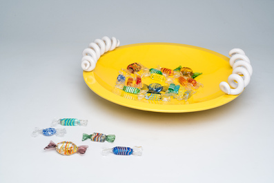 A French 'Cr&eacute;ation Mathias' monochrome yellow bowl with spiral handles and a collection of Italian Murano glass sweets, 20th C.