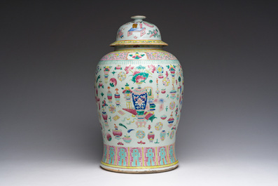 A Chinese famille rose 'antiquities' vase and cover, 19th C.