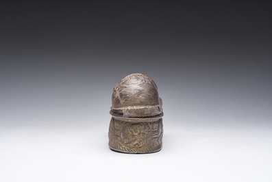 A Byzantine silver reliquary or pyxis with various saints, probably 8th/12th C.