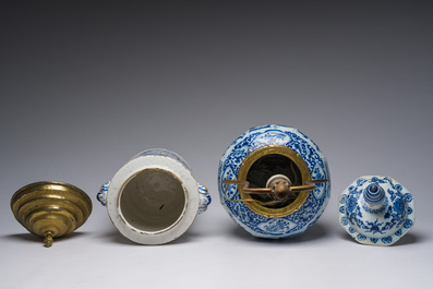 Five blue, white and polychrome Dutch Delft dishes, a lamp-mounted vase and a Brussels faience tobacco jar, 17th/19th C.