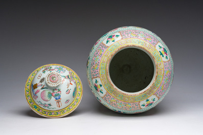 A Chinese famille rose 'antiquities' vase and cover, 19th C.